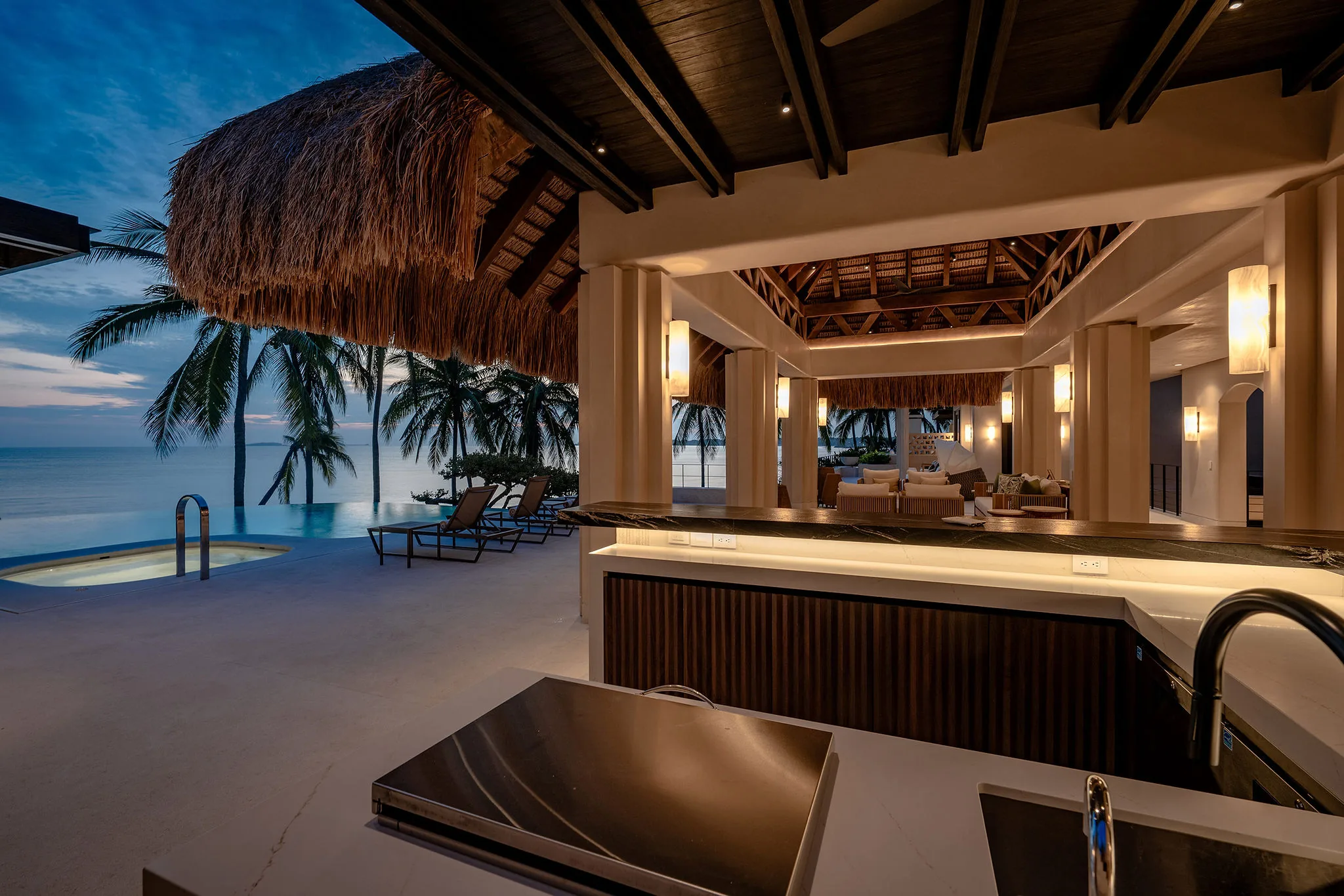 Casa Happy Paws, Punta Mita: open-air villa at sunset with thatched roof, pool, ocean view in Ranchos Estates.