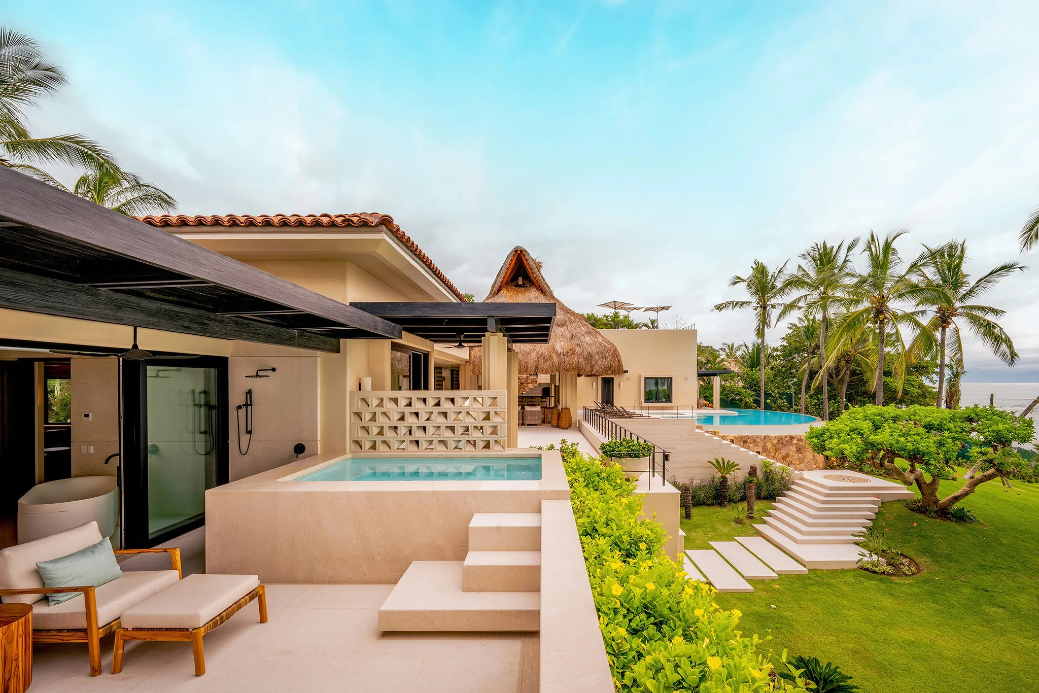 Casa Happy Paws, Ranchos Estates Punta Mita: private plunge pool, lush garden, and infinity pool with ocean view.