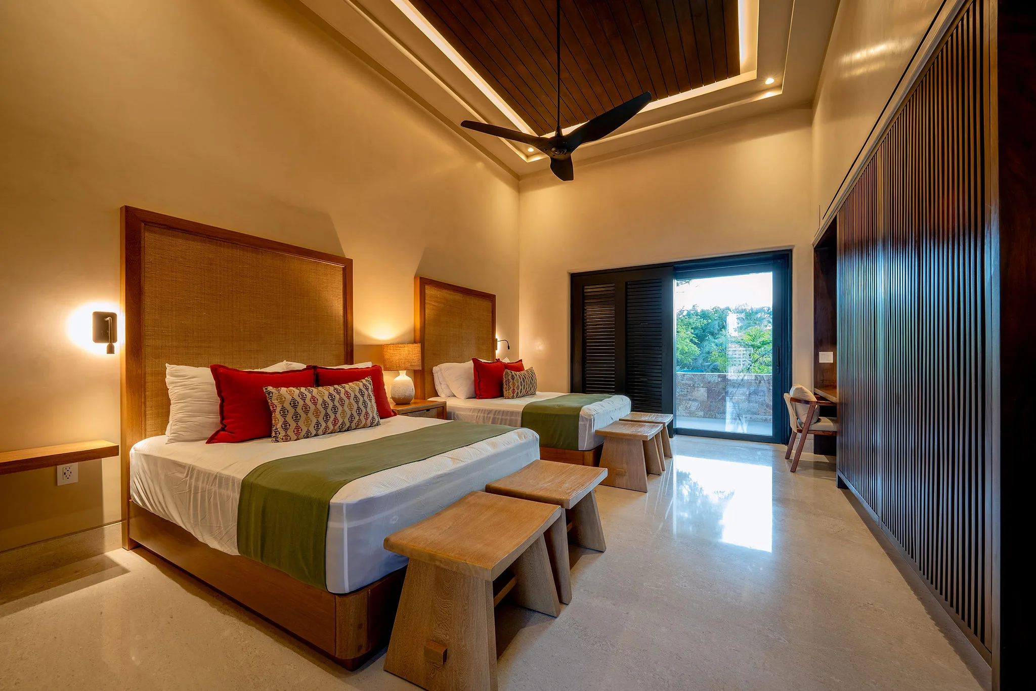 Chic Casa Happy Paws room in Punta Mita, Ranchos Estates; two double beds, balcony with lush views, stylish accents.